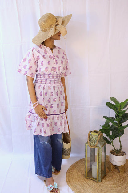 white base knee length lavender blockprint dress.