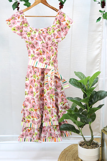 Pink floral blockprint dress on hanger