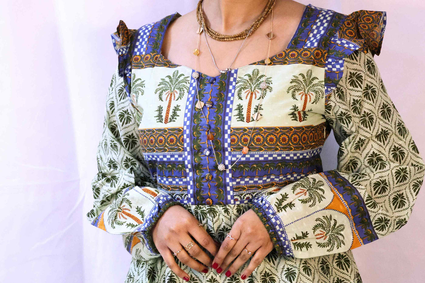 green blockprint palm dress closeup